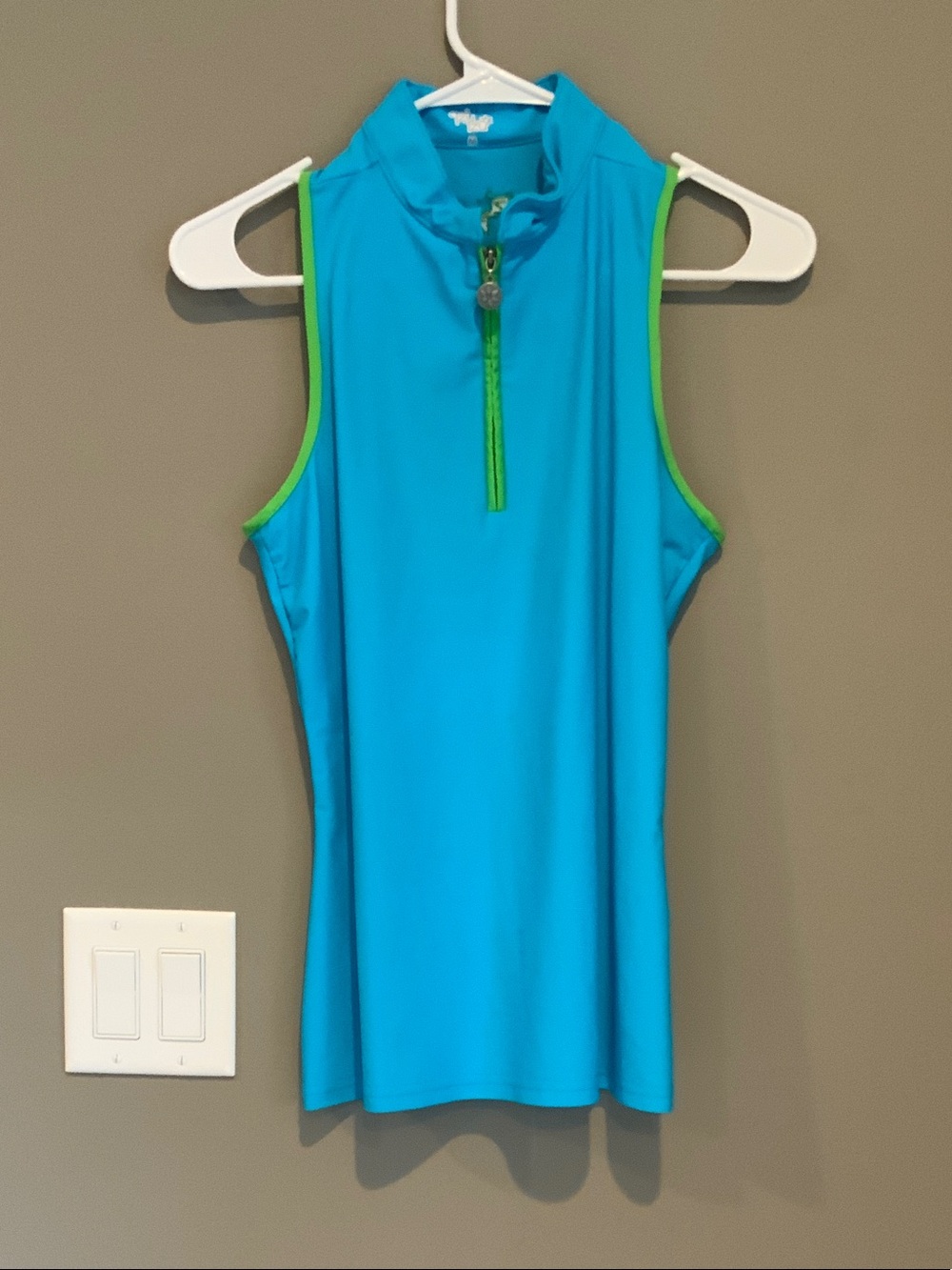Tzu Tzu Sleeveless Golf Polo in Bright Turquoise with Lime Trim